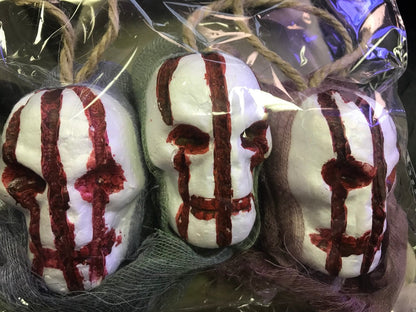 3 Bloody Hanging Skulls with Mesh Netting Hoods